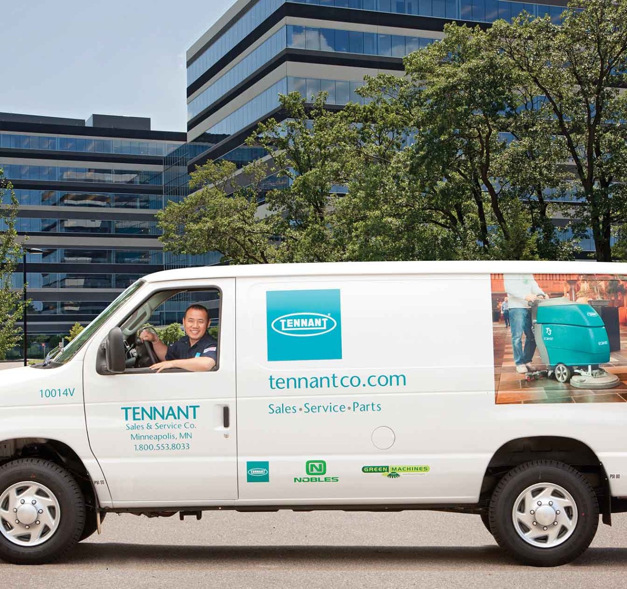 Tennant service van outside of an office building