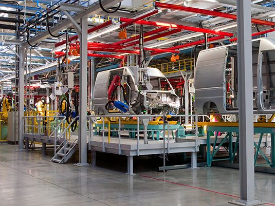 A clean floor in manufacturing plant: in an industrial environment, cleaning can help maintain productivity