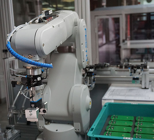 Robotic arm used in manufacturing facility