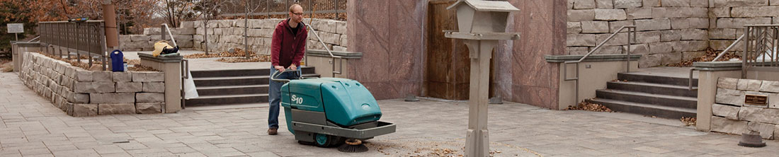 S10 Walk-Behind Sweeper cleaning outdoors