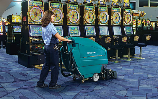 Tennant Company carpet extractor cleaning casino showroom