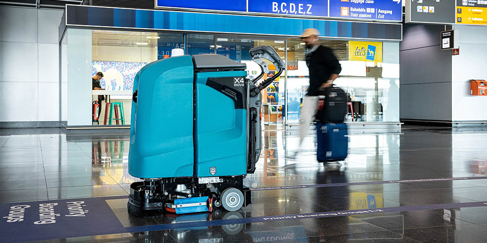 Side view of Tennant X4Rovr Robotic Floor Scrubber in Frankfurt Airport