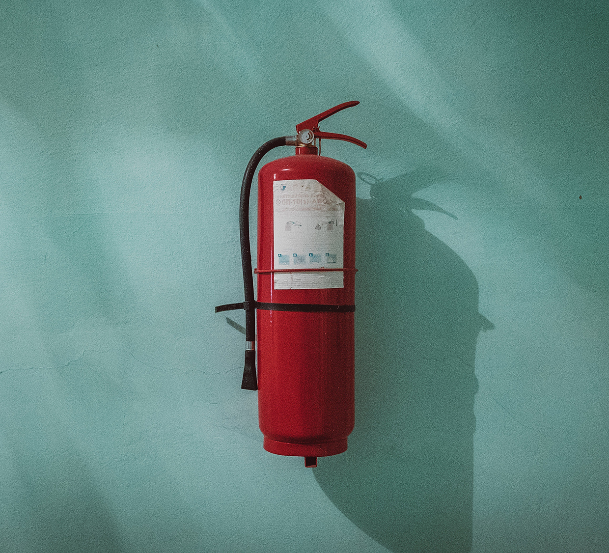Fire extinguisher on wall
