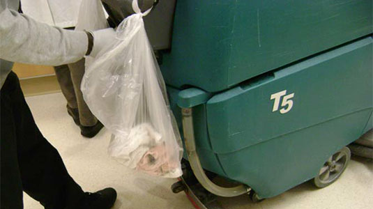 Example of customer hanging trash bags on their machine 