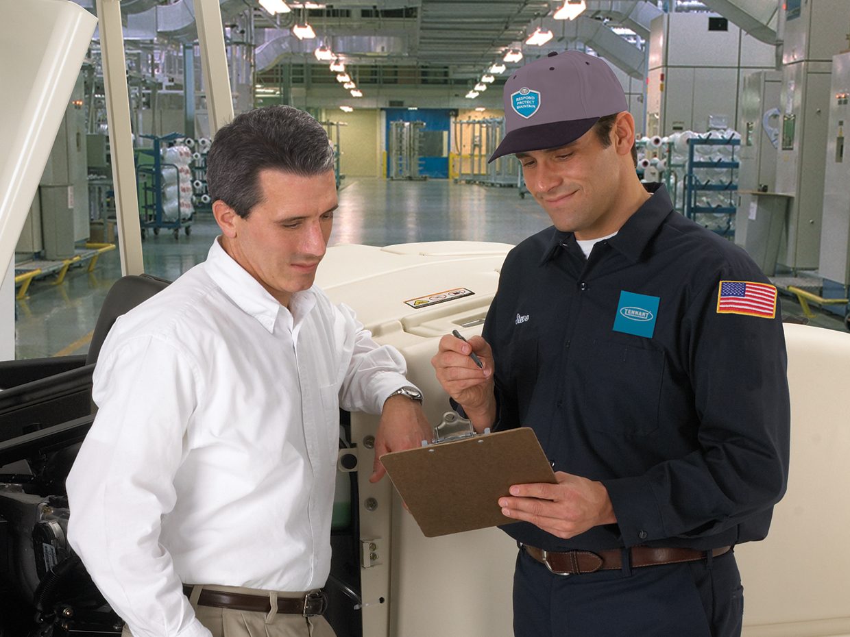 Service Technician and Customer viewing planned maintenance information