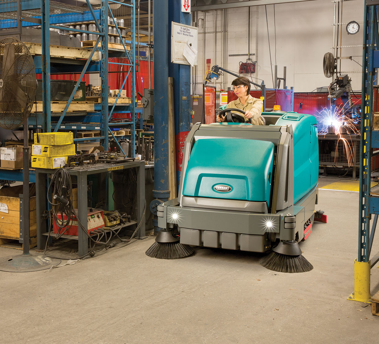 M17 Ride-On Sweeper-Scrubber in a manufacturing environment