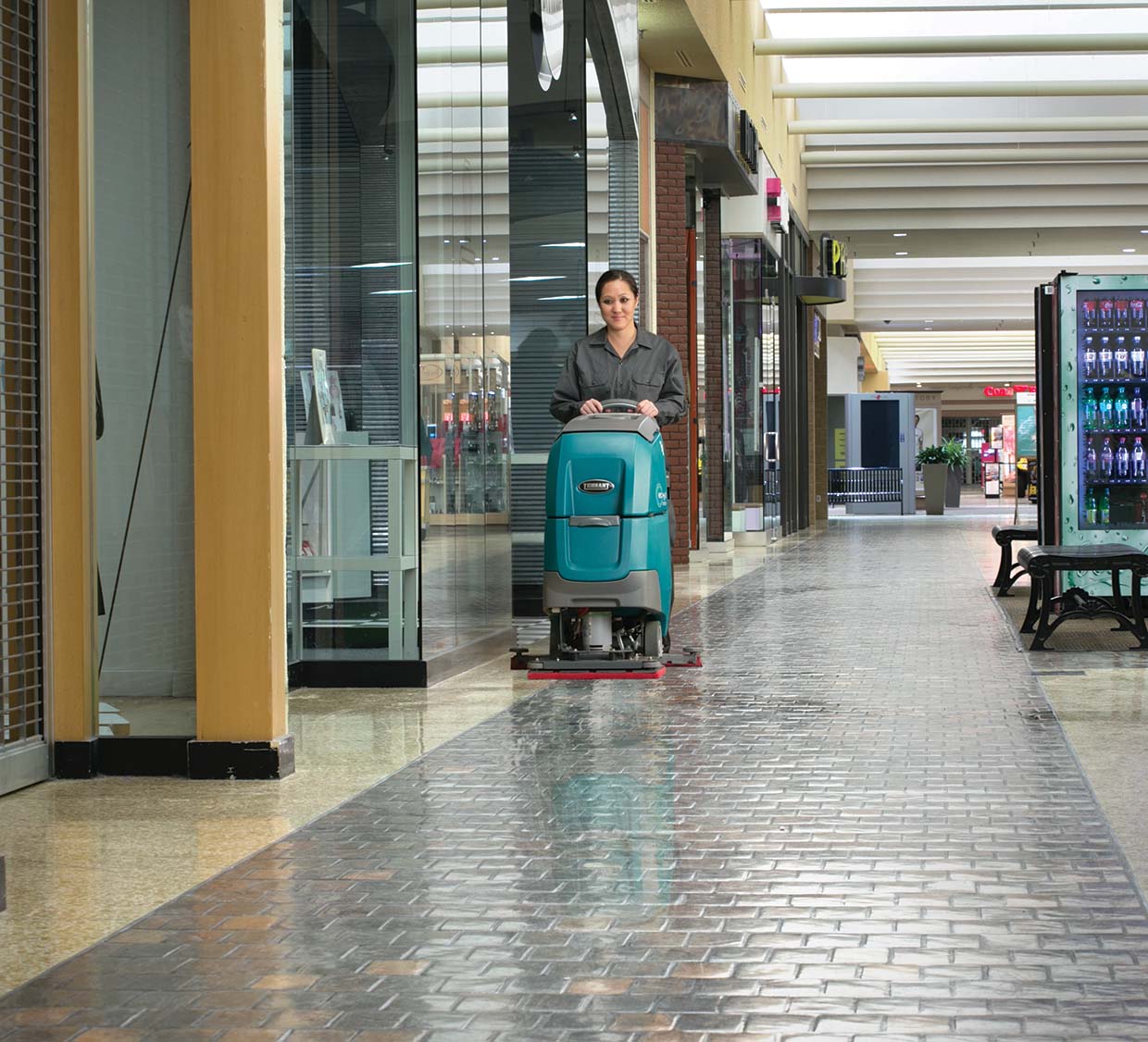 Orbital T300 Walk-Behind Floor Scrubber cleaning in a shopping mall