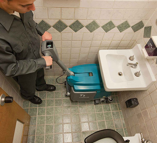 T1B cleaning bathroom