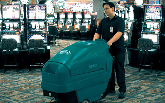 Tennant Company carpet extractor cleaning casino showroom