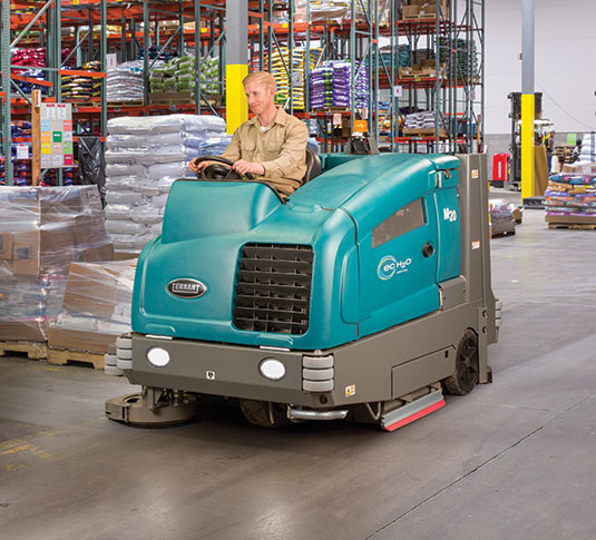 M20 Ride-On Sweeper-Scrubber cleaning a distribution center / warehouse