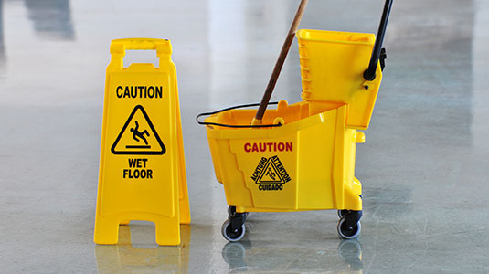 Wet floor sign on floor