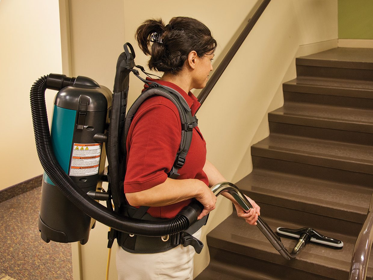 Backpack Vacuum in Use Cleaning Stairs