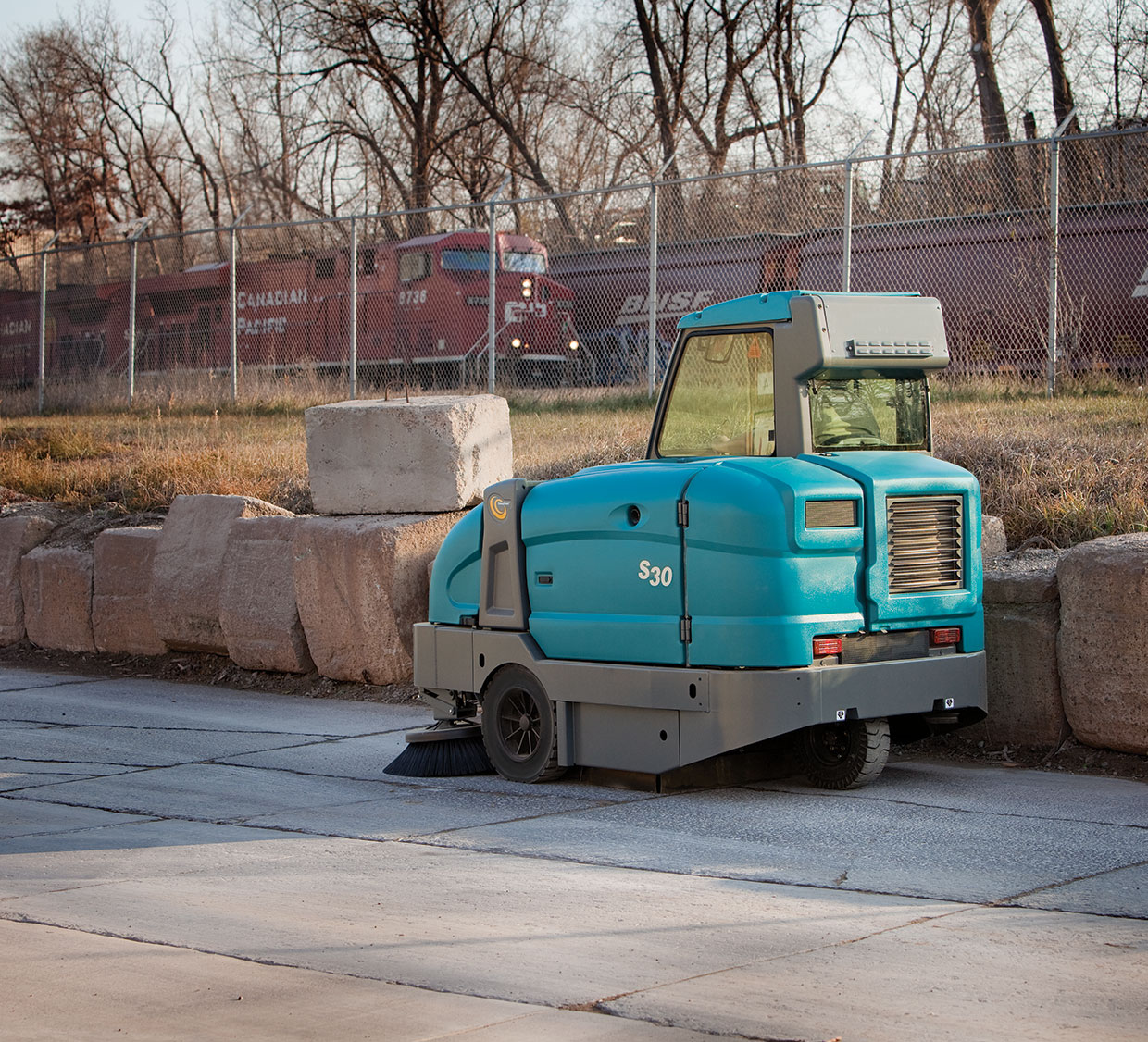 S30 Rider Sweeper Cleaning Outdoors