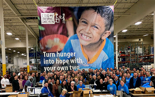 Tennant employees volunteered to make maternity baskets for expecting mothers with the YMCA