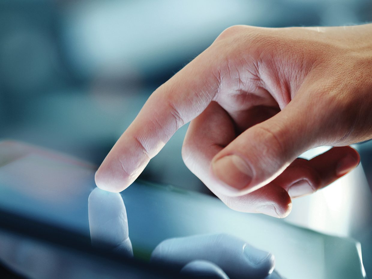 Business person working on digital device