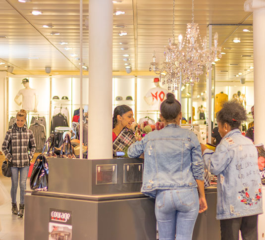 Shoppers checking out at retail store