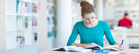 Studying in library image
