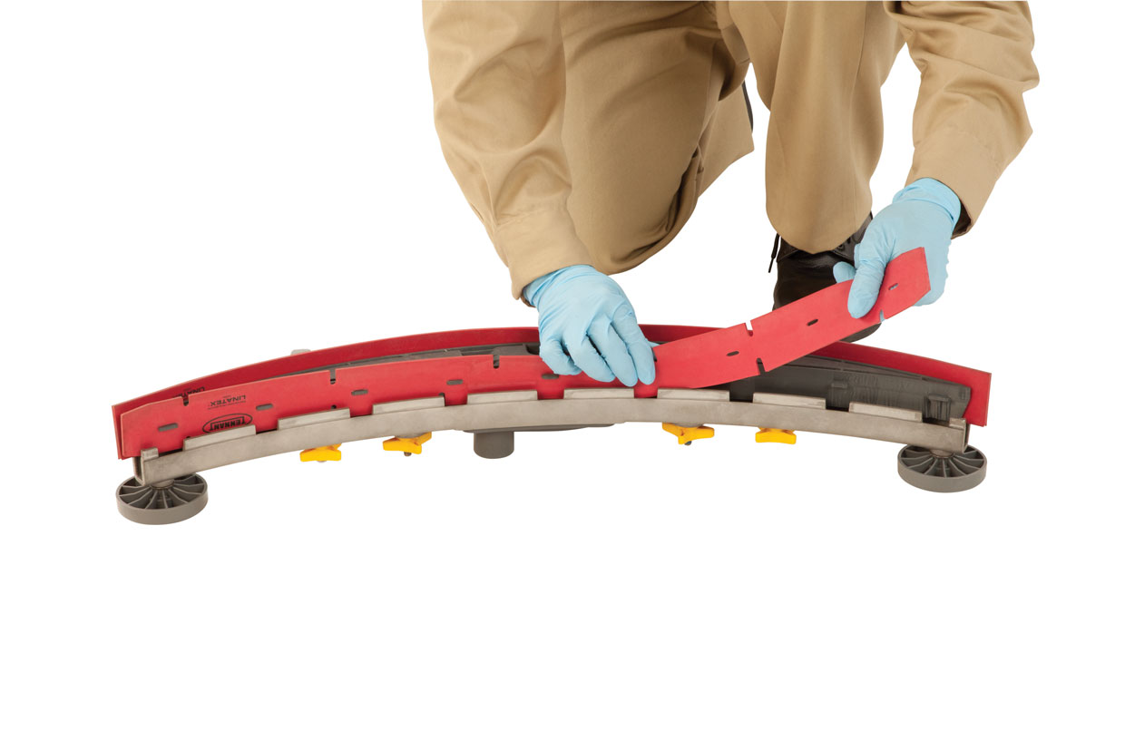 Person in gloves replacing squeegee