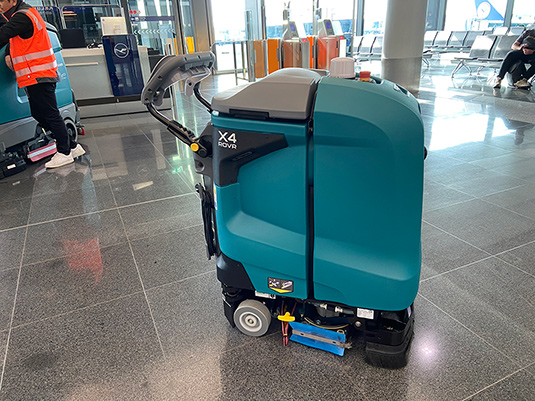 X4rovr Robotic Scrubber Cleaning the Airport